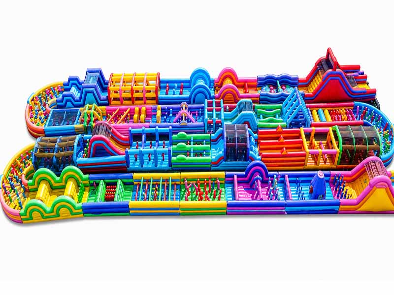 E110102 Rainbow Mega Inflatable Obstacle Course - Image 1
